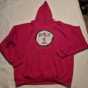Gildan Dryblend women's XL Red hoodie, has a tiny hole pictured on the left